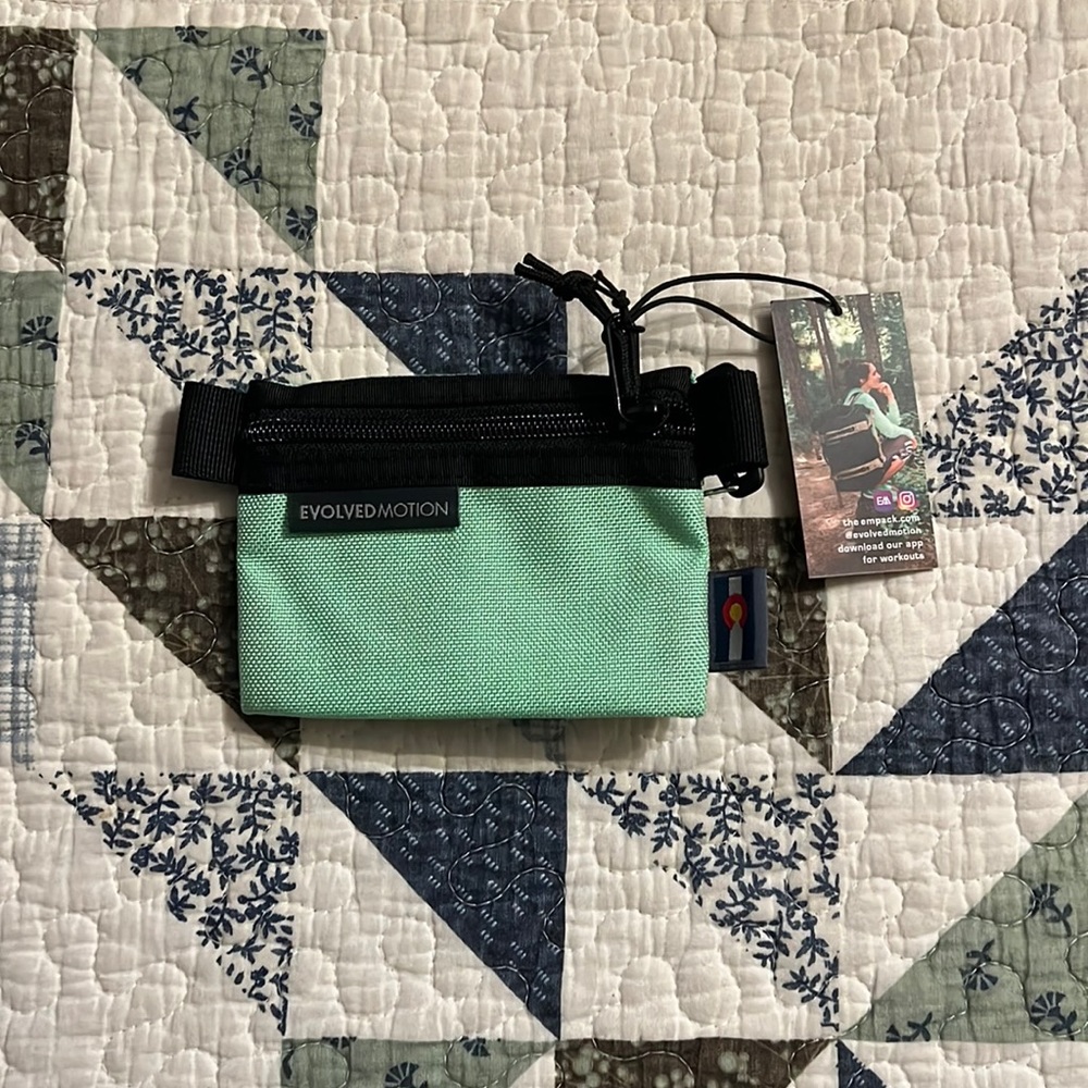 Evolved motion- coin purse with clip